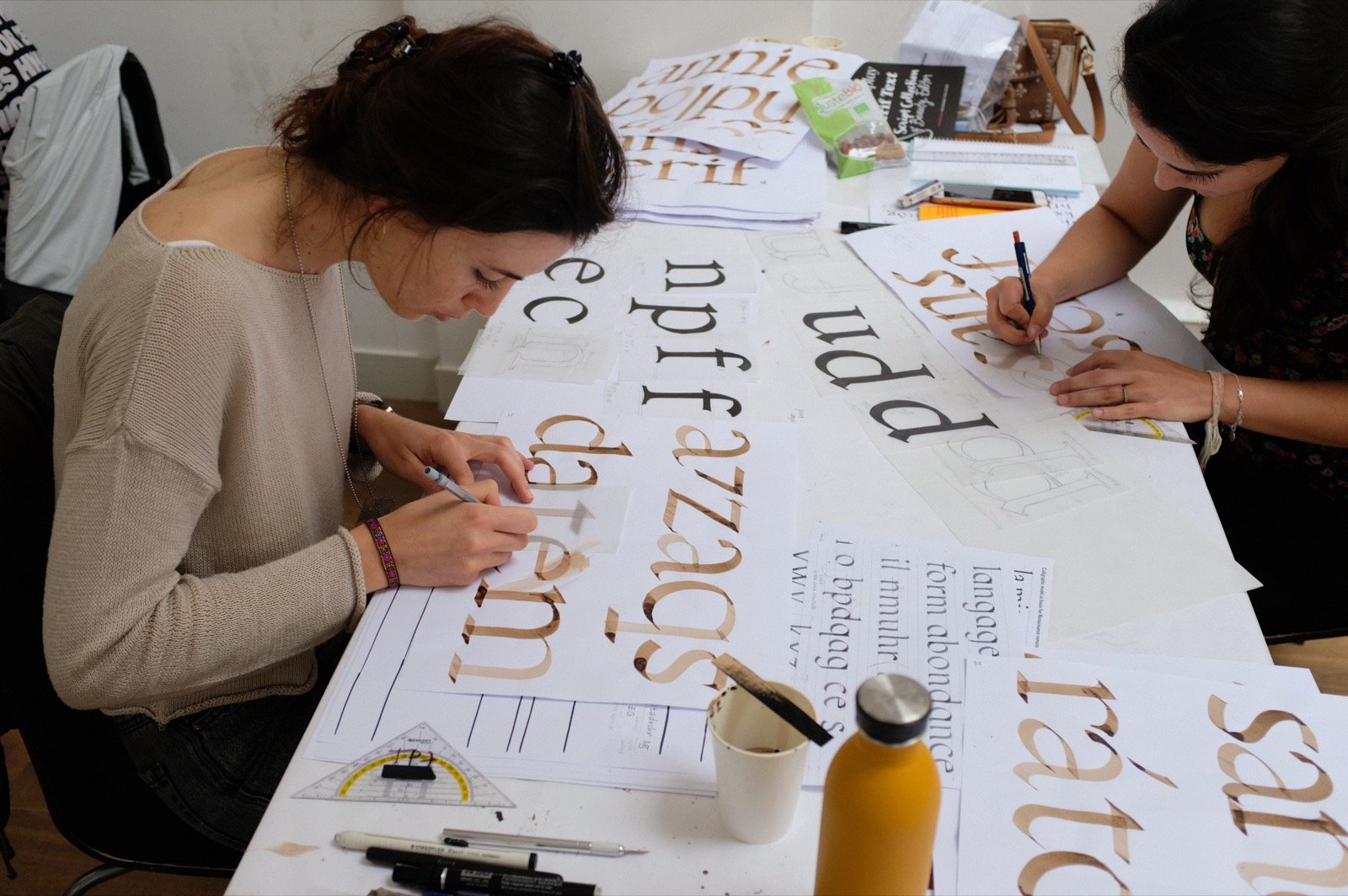 Participants practising calligraphy TypeParis 2018
